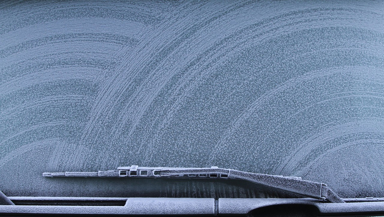 photo of detail car wiper on car wash